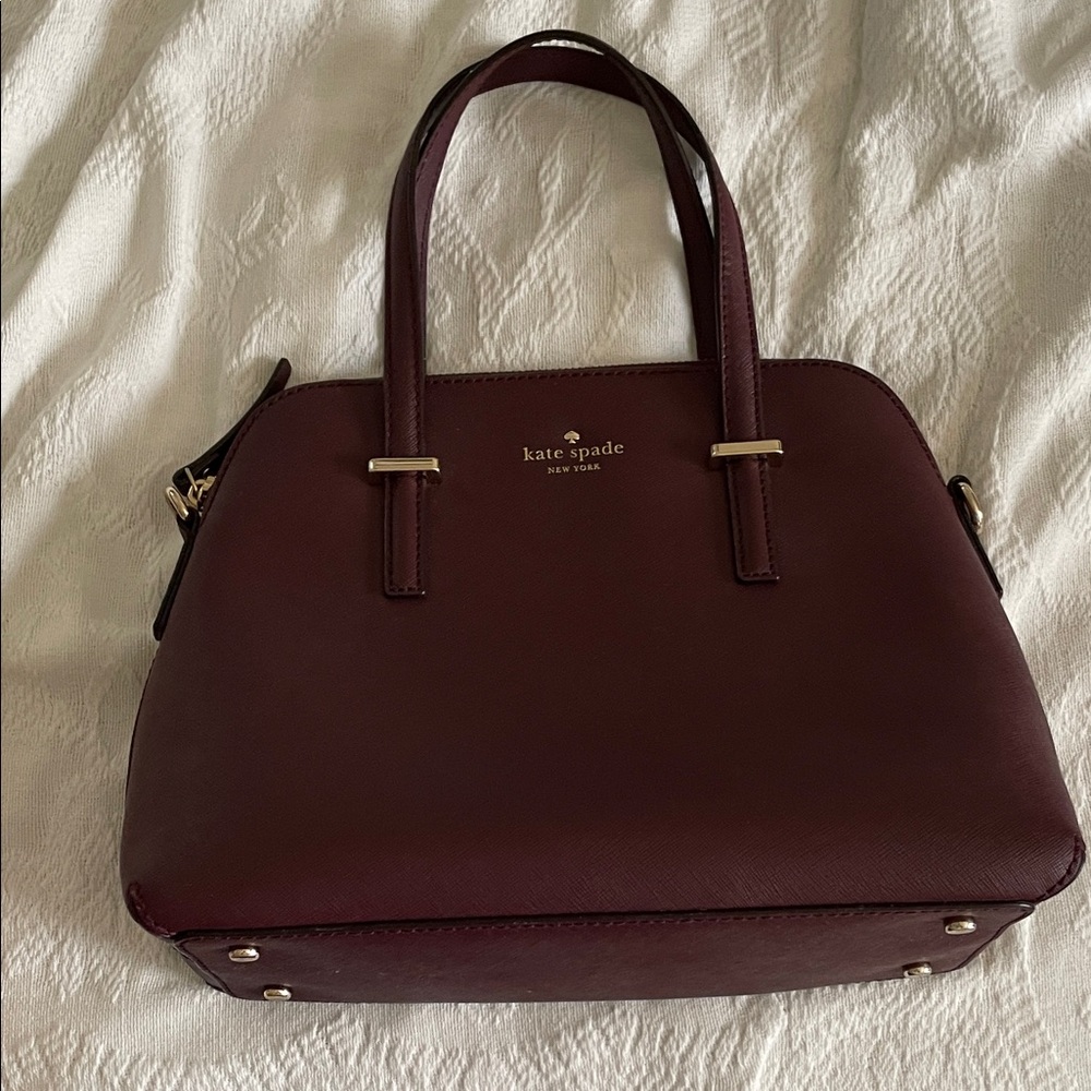 Kate Spade Burgundy Bowler Purse with Structured Design and Gold Accents